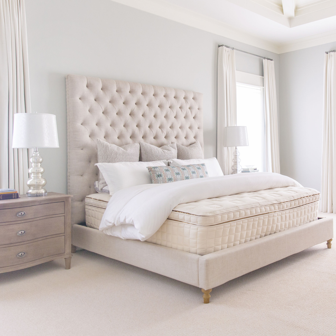 Naturepedic EOS Pillowtop hero shot in fully dressed bedroom.