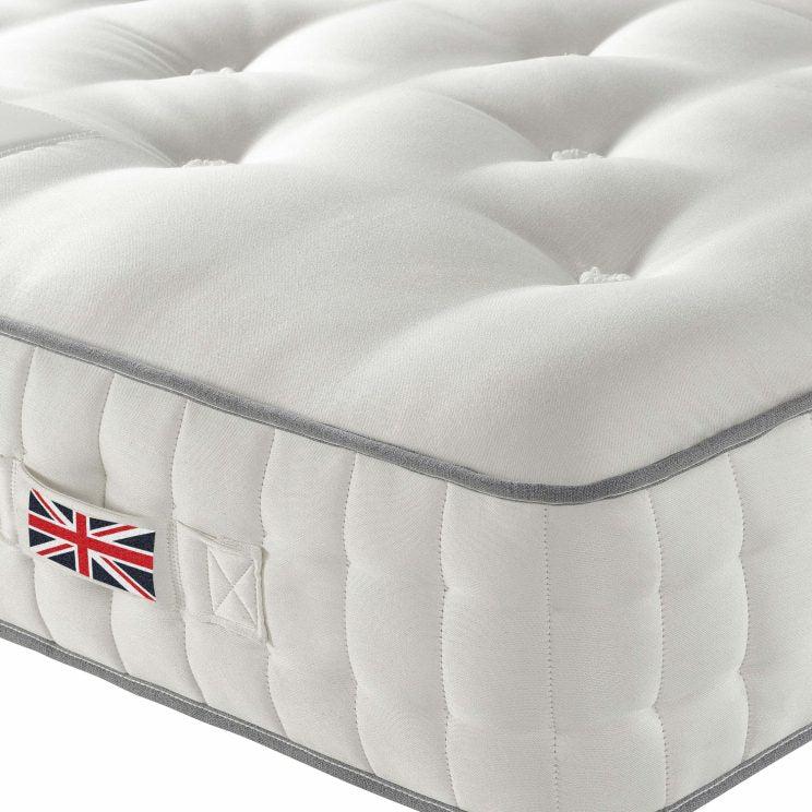 Harrison Spinks Euston corner detail with British flag on handle.