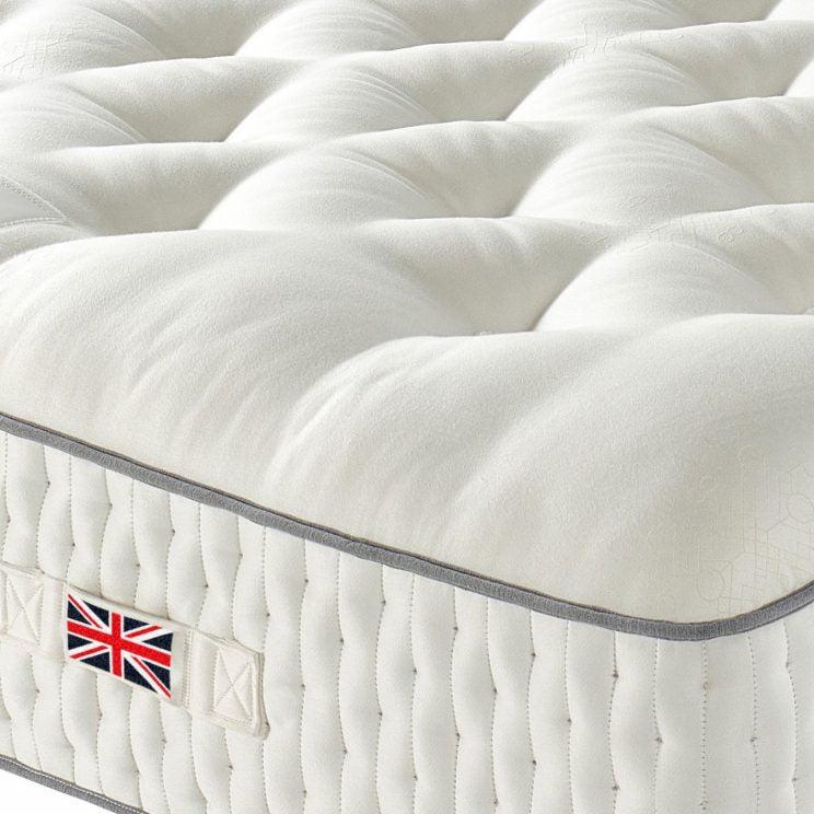 Harrison Spinks Strand corner detail with British flag.