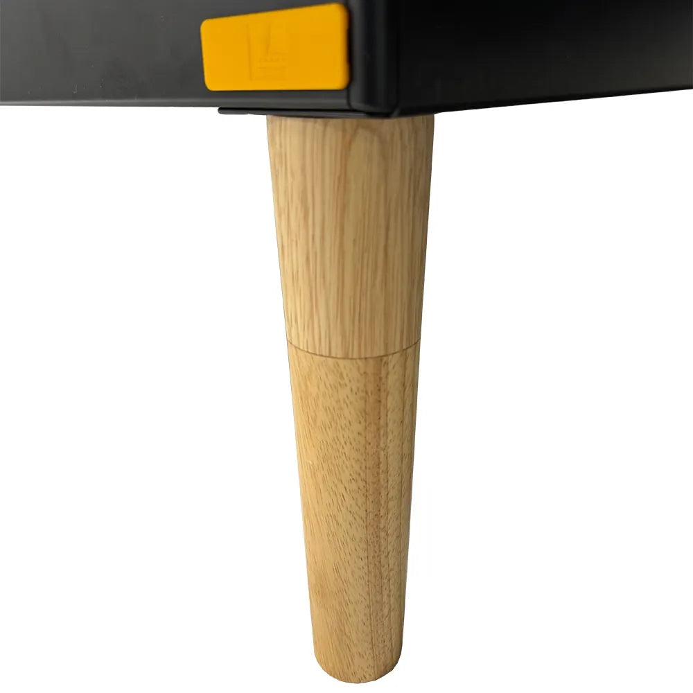 Close up of the Naturepedic Conductor Adjustable Base solid oak wood legs.