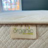 The Organic Mattress product tag on The Noddingham mattress.