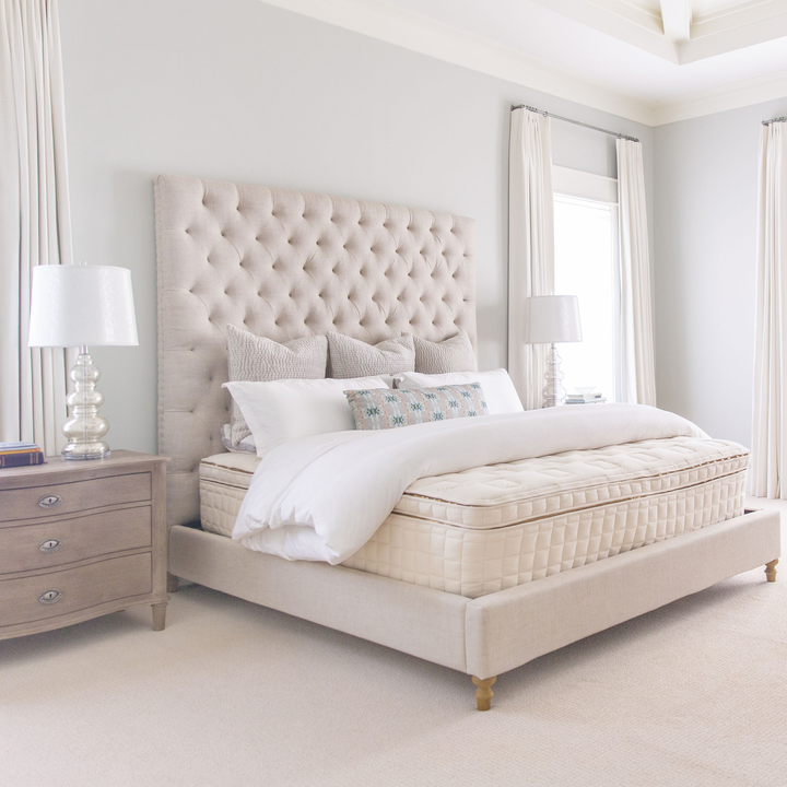 Naturepedic EOS Pillowtop hero shot in fully dressed bedroom.